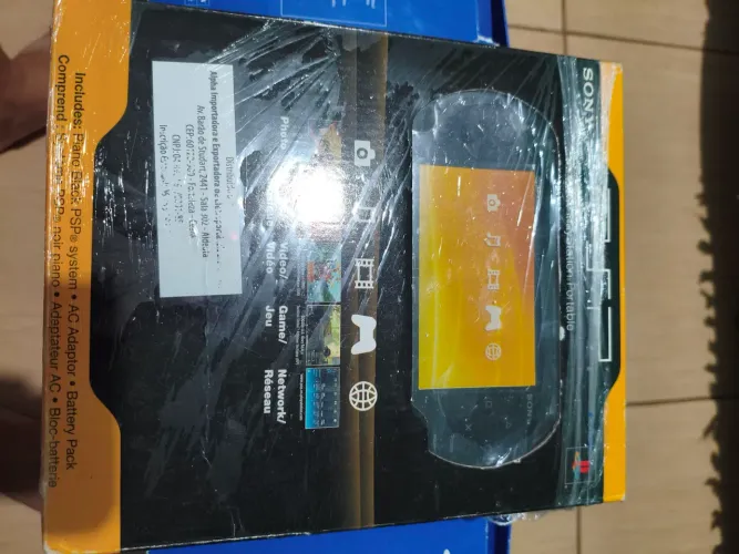 PSP na caixa com tudo original serial batendo
