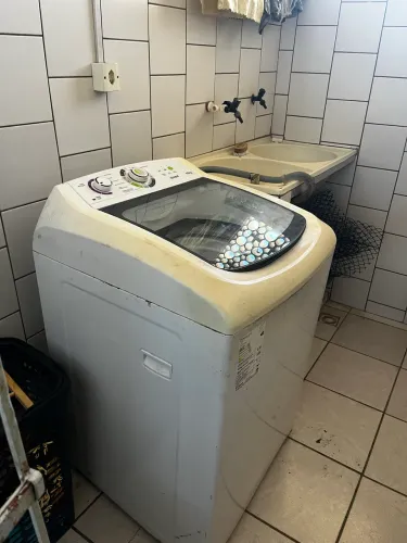 Máquina de lavar com defeito