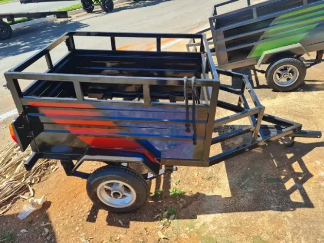"Carretinha pra puxar em moto supermercado etc fechos de molas pra até 300kg fábricamos to