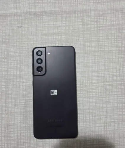Celular SAMSUNG S21-FE usado, com bateria trocada.