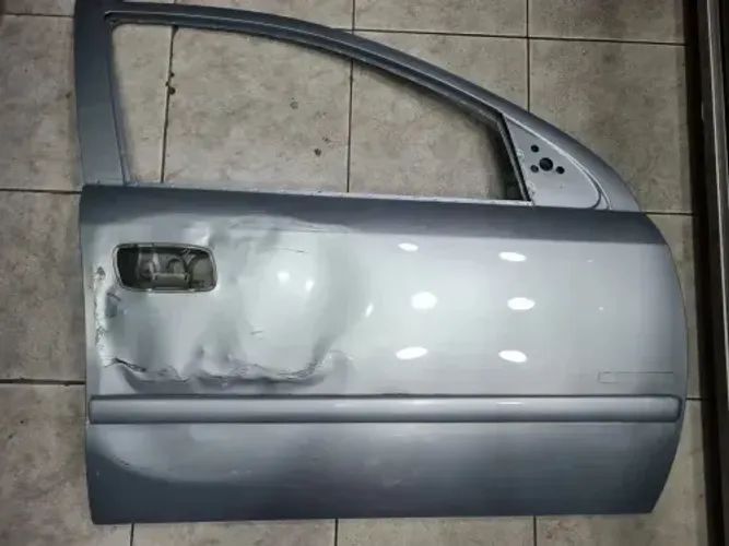 Porta Astra 2007 com Amacado da pra Reparar não está emenda lado esquerdo