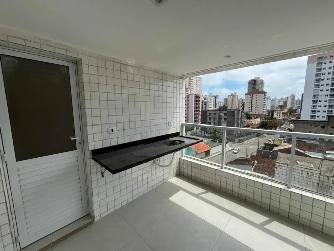 Apartamento à venda na Aviação em Praia Grande | 2 dorms, 1 suíte, varanda gourmet e 2 vag