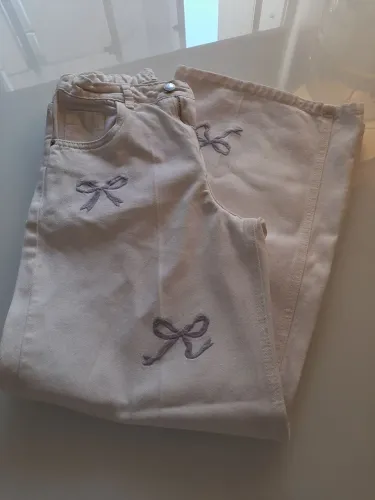 Calça jeans off White laços infantil menina 9/10 anos viagem férias praia piscina