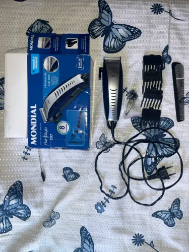 Máquina de cortar cabelo mondial R$90