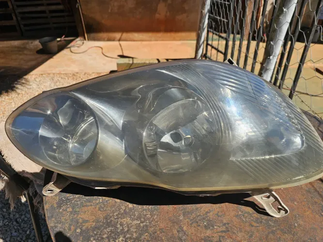 Farol da Corolla Fielder original 2005 a 2008 lado esquerdo (motorista)