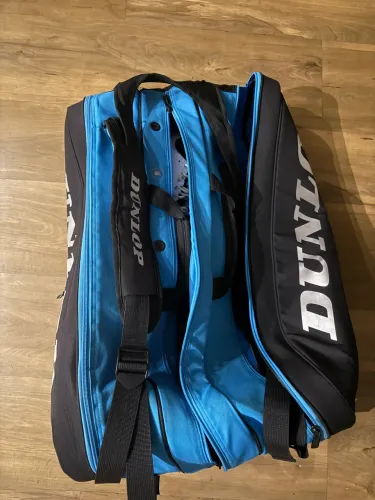Raqueteira Dunlop FX Térmica ? Preto/Azul ? Usada (bem conservada)