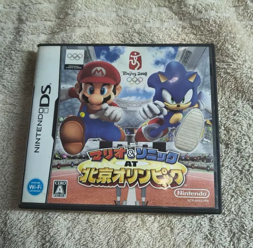 Encarte e embalagem do jogo Mario & Sonic at the Olympic Games