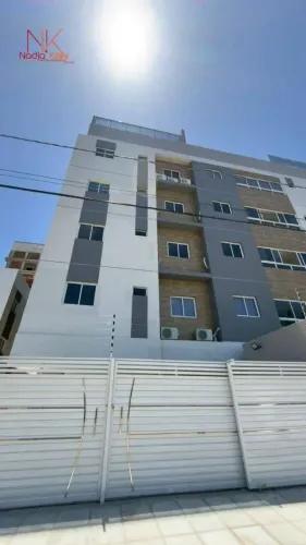 Apartamento com 2 dormitórios à venda, 56 m² por R$ 450.000,00 - Camboinha - Cabedelo/PB