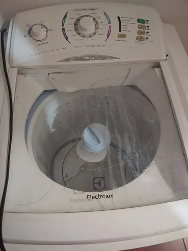 Máquina de lavar com defeito
