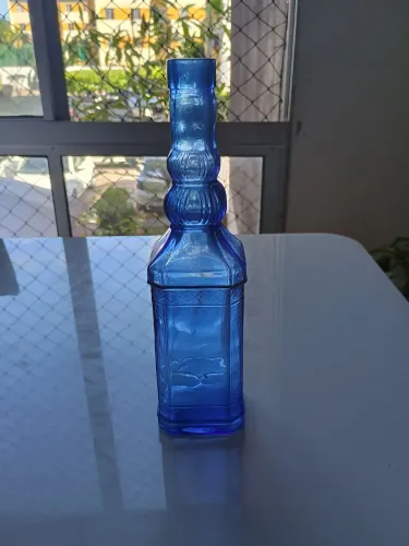 Garrafa de vidro azul Vintage