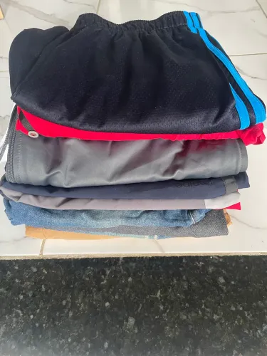 Caixa roupa 20 peças masculina e feminina por 20 reais.