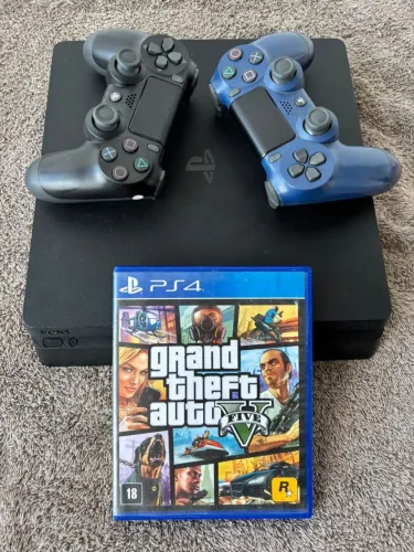 Ps4 1 tera 2 controles e jogo de brinde