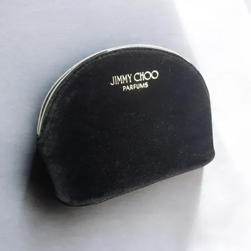 Necessaire meia lua, veludo, preta<br>Jimmy Choo, nova<br>Faço Olx