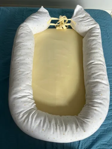 NINHO REDUTOR DE BERÇO HUG