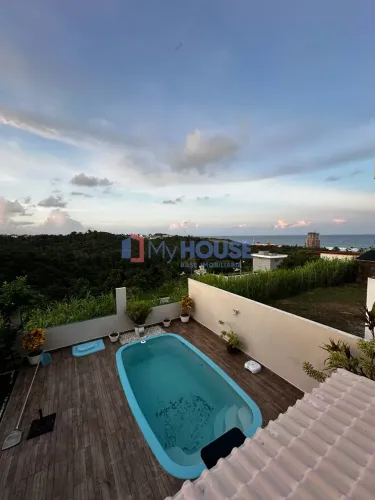 Casa à venda com piscina e vista para o mar da praia dos Milionários no condomínio Mar à V