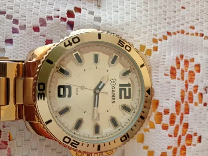 Relogio Xgames Eztra Grande dourado