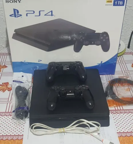 Ps4 slim 1 terá caixa nota 2 controles 50 jogos fifa 26 pes 26