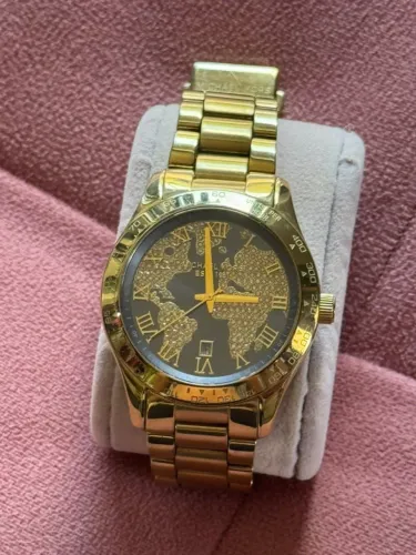 Relógio Michael Kors MK-6243 dourado com mapa no mostrador