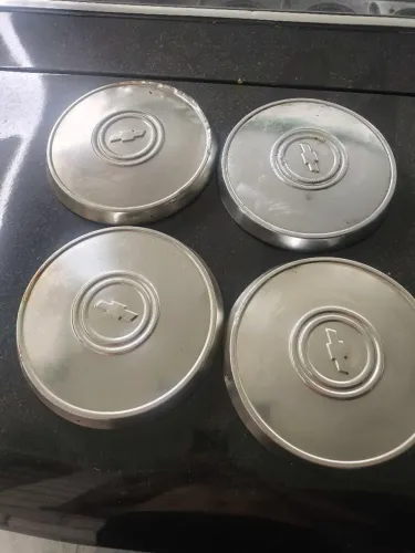 4 calotas de opala 120 reais as 4