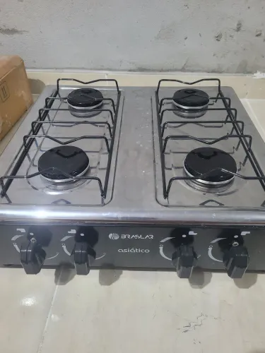 Vendo fogao de mesa por 250 novo.