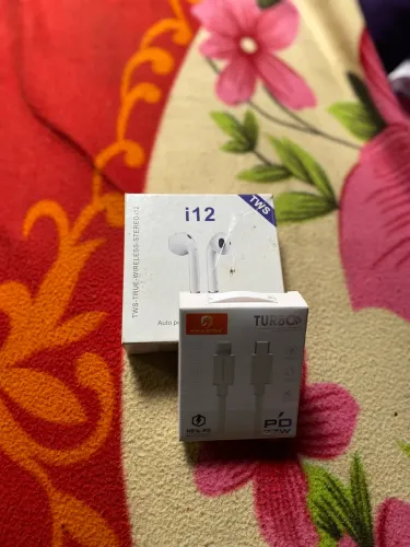 Cabo de carregador iPhone e fone de ouvido Bluetooth