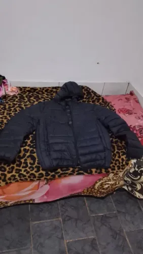 Jaqueta de frio ótimo pra quem tem moto ela veste M e G 
