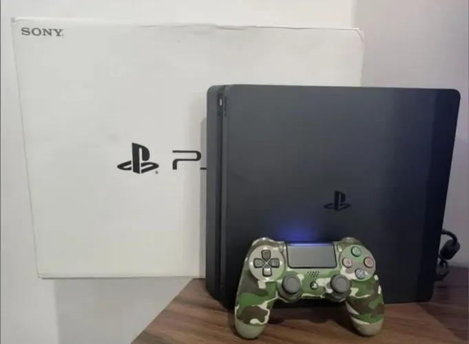 PS4 Slim 500gb semi novo+ garantia+jogo físico+ controle novo