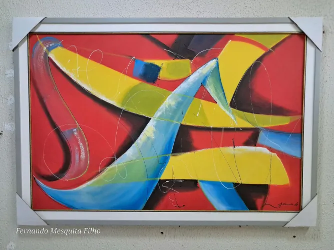 Quadro abstrato colorido em tons de vermelho, amarelo e azul