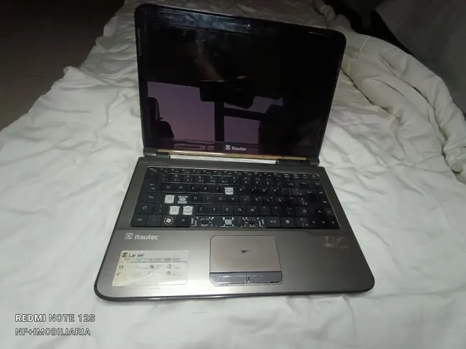 Notebook Itautec - retirada de peças