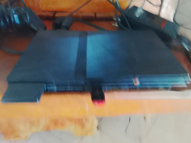 Play 2 todo original, bem conservado.