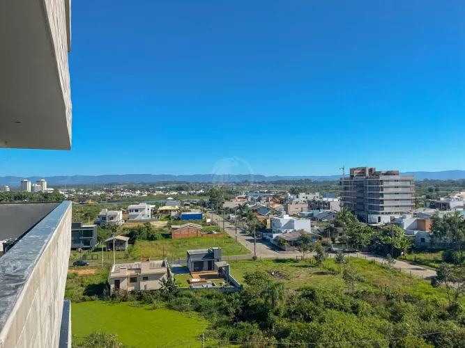 Apartamento de 02 dormitórios com vista para o Rio.