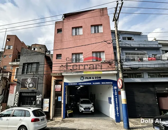 Prédio Comercial e Residencial, sendo 1 loja e 4 apartamentos em Santa Teresinha.