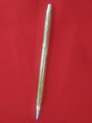 Caneta dourada cross