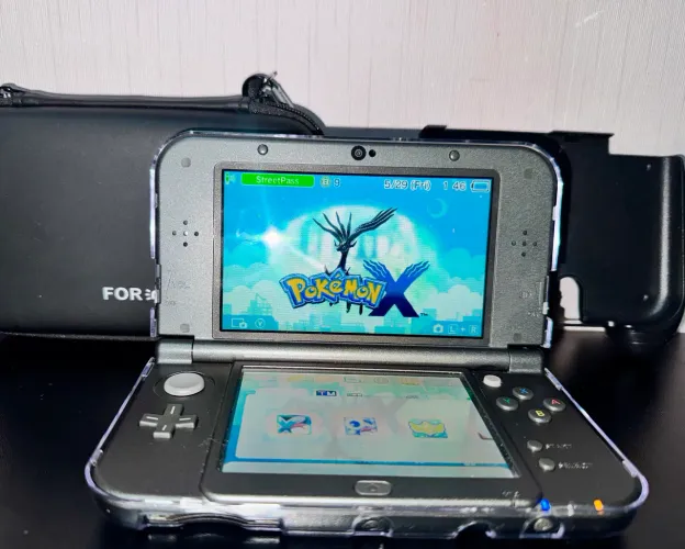 NEW NINTENDO 3ds XL c/ case acrílica, case preta e JOGOS