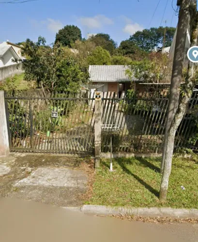 Terreno com 3 casas