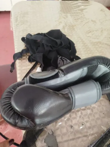 Luvas para muay Thai e bandagem