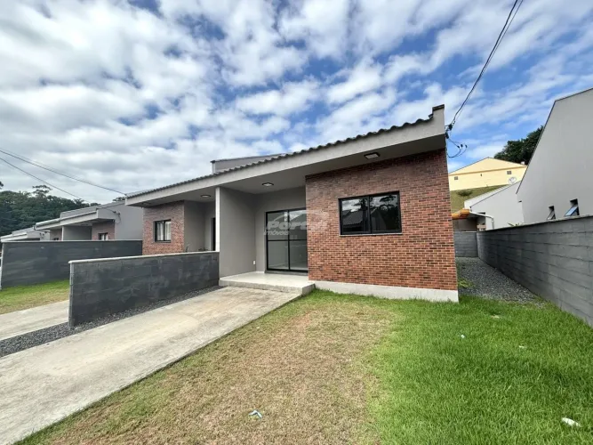 Imóvel com aproximadamente 70m², contendo 02 dormitórios sendo 01 suíte, ampla sala de est