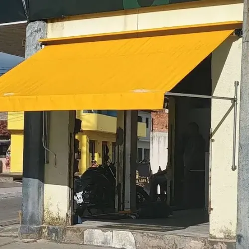 Toldo retratil amarelo