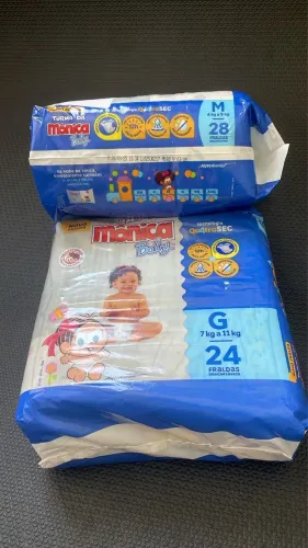  2 pacotes de fraldas turma da Mônica 