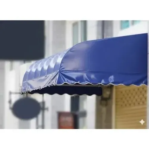 Toldo fixo de lona para área externa.