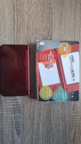New nintendo 3ds xl usado com 2 jogos e carregador