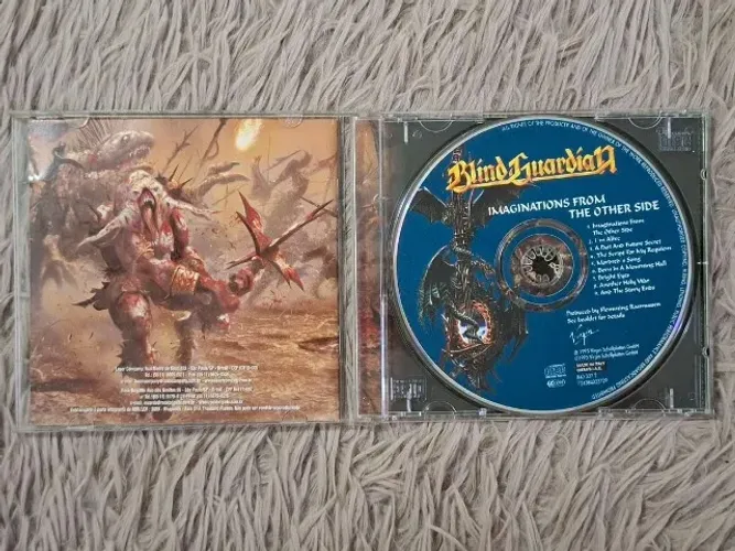 Rhapsody Rain of a Thousand Flames e Blind Guardian Imaginations From The Other Side CDs