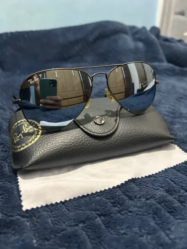 Óculos Ray-Ban aviador original com lentes espelhada polarizada.