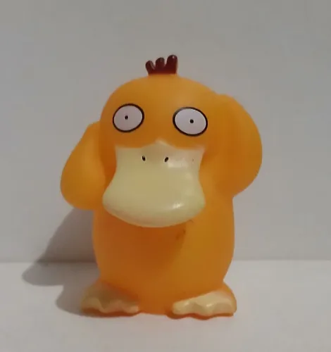 BONECO ACTION FIGURE MINIATURA POKEMON PSYDUCK OCO POR DENTRO