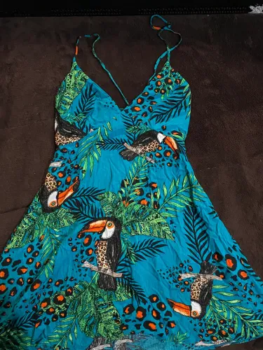 Vestido curto floral tucano amarração nas costas