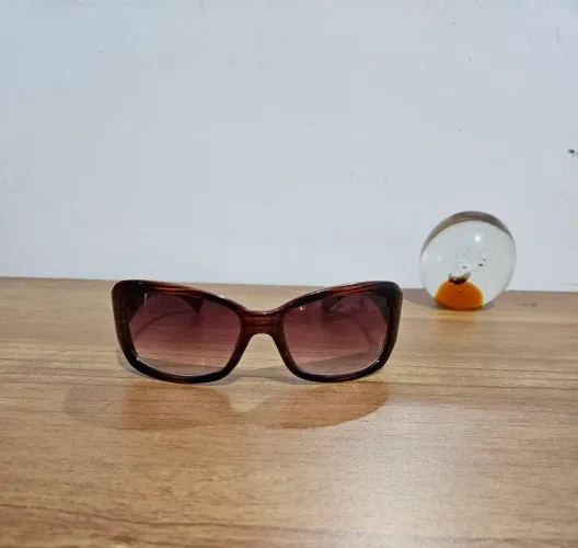 Óculos uv oscar de lá renta perfeito