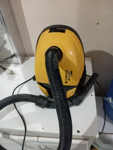 aspirador de pó funcionando 70