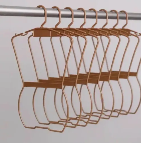 IMPERDÍVEL!!!! 45 cabides silhueta em plástico resistente na cor cobre