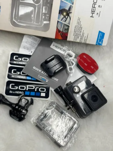 GoPro HERO+ com caixa, manuais e acessórios