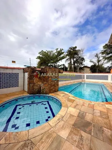 Village com 2 dormitórios à venda, 86 m² por R$ 690.000,00 - Centro - Bertioga/SP
